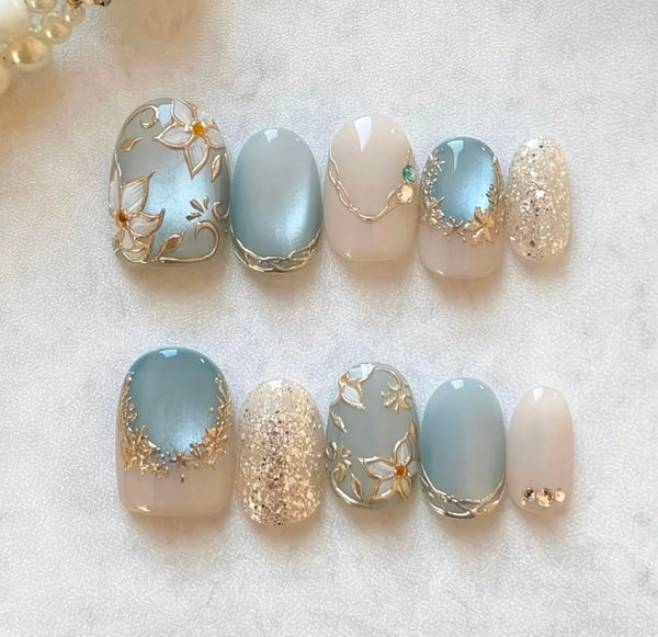 Elegant Blue Floral Nails – Gold Leaf & Glitter Luxury Design