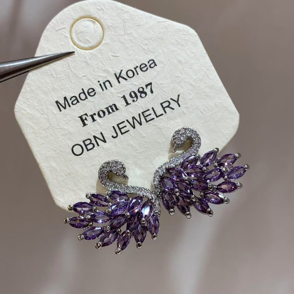 Luxury Crystal Swan Earrings – Purple, Black & White