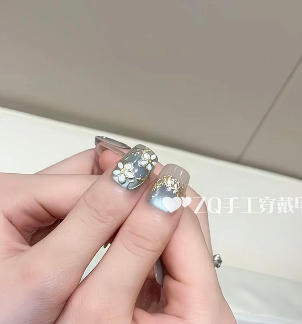 Elegant Blue Floral Nails – Gold Leaf & Glitter Luxury Design