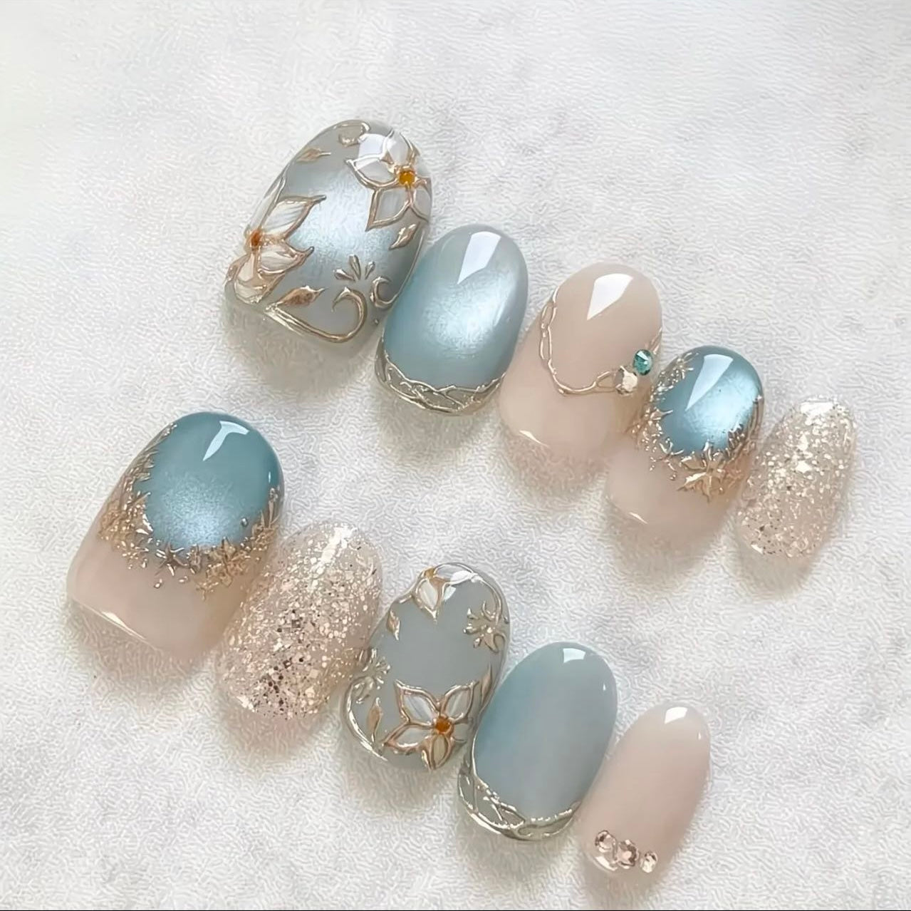 Elegant Blue Floral Nails – Gold Leaf & Glitter Luxury Design